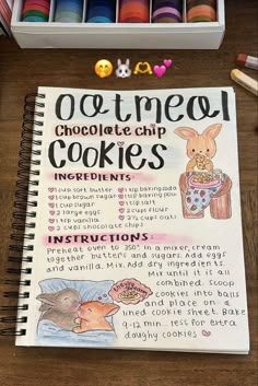 a recipe book with instructions for chocolate chip cookies and crayons on the table