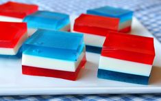 red, white and blue jello bars on a plate