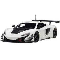 a white and black sports car is shown on a white background with no people around it