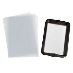 a black and white photo frame next to some clear plastic sheets on a white background