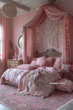 a bedroom with pink walls and curtains