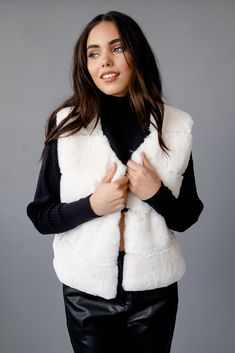 DetailsA faux fur vest featuring a v-neckline and a open front.Model is wearing a size Small. Content + Care- 100% Polyester- Hand or machine wash cold Size + Fit Measurements taken from size Small.- Full length: 21"- Bust: 40" Faux Fur Vest Women, White Fur Vest, Fur Vest Women, Women Faux Fur Vest, White Faux Fur Vest, Fur Vests, Vest Women, Faux Fur Vest, Faux Fur Vests