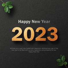 a happy new year card with the number twenty and two leaves on it, surrounded by greenery