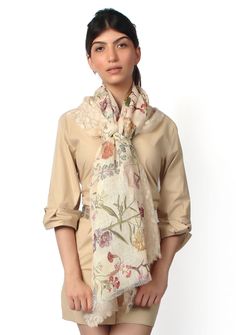 Step into a floral garden with this exquisite linen printed scarf adorned with a captivating beige bold leaf lace. Crafted from breathable linen fabric, it offers a refreshing and comfortable feel. The exquisite bold leaf lace pattern adds an element of sophistication, making it a statement accessory. This versatile scarf effortlessly enhances both casual and formal outfits. Luxury Beige Pashmina Shawl With Embroidered Border, Luxury Beige Pashmina Shawl With Dupatta, Linen Scarves, Chic Accessories, Formal Outfit, Lace Pattern, Scarf Print, Linen Fabric, Cashmere