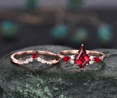 Elegant Stackable Ruby Wedding Ring, Elegant Stackable Ruby Ring For Wedding, Marquise Cut Ruby Jewelry For Weddings, Elegant Emerald Cut Lab-created Ruby Jewelry, Elegant Emerald-cut Lab-created Ruby Jewelry, Fine Jewelry With Lab-created Ruby For Wedding, Elegant Red Stackable Jewelry, Red Diamond Marquise Cut Jewelry, Red Marquise Cut Diamond Jewelry