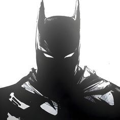 a black and white photo of a batman