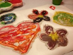 the child's artwork is being displayed on the tray