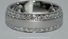 an image of a wedding ring with diamonds on it