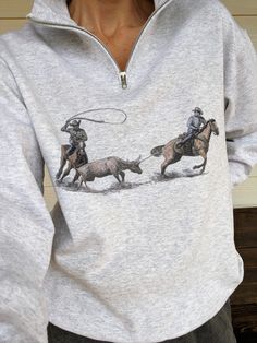 Team Roping Shirt in Ash Gray - Unisex Fit Please note the difference between the regular T-shirt sizing and Bella Canvas Sizing!! Shirts are sublimation - designs will have a vintage style look to it. Art by Trish McMurry ❤️ All items are made especially for you and in house by The Ranchy Roan...which is why my turnaround time is the length that it is. Thank you for shopping thoughtfully & supporting a small business. Rodeo Clothes, Western Women Outfits, Team Roper, Western Women, Horse Shirt, Cute Country Outfits, Rodeo Outfits, Western Outfits Women, Picture Outfits