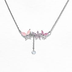 Our Dixie Necklace is the perfect way to add a pop of pink and whimsy to your look! Featuring a beautiful butterfly charm, it's sure to flutter its way into your heart! You'll never want to take it off! Pink Clavicle Chain Charm Necklace For Party, Feminine Pink Necklace With Adjustable Chain, Pink Flower Pendant Necklace With Clavicle Chain, Pink Delicate Charm Necklace With Delicate Chain, Pink Flower Pendant Clavicle Necklace, Delicate Pink Charm Necklace With Delicate Chain, Butterfly Charm Pendant Necklace For Party, Pink Pendant Charm Necklace With Delicate Chain, Butterfly Pendant Necklace For Party