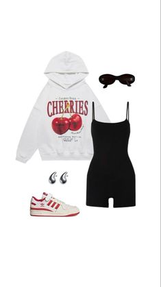 a white hoodie, black shorts and red sneakers are featured in this fashion photo