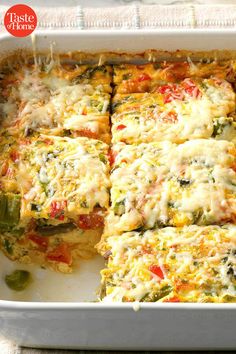 a casserole dish filled with vegetables and cheese