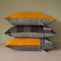 three pillows stacked on top of each other