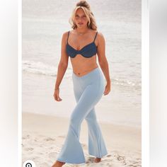 This Flared Knit Pant Is Soooo Camille. Crafted From Lightweight Baby French Terry, It's The One You'll Reach For On Beach Days And Any Day. Low Rise Dips Into V-Shape At Back With Shirring 93% Polyester / 7% Spandex Hand Wash Cold. Wash Colors Separately. Use Only Non-Chlorine Bleach. Line Dry. Low Iron. Imported 30.5" Inseam Crochet Beach Pants, Strapless Beach Dress, Knit Beach Dress, Black Sleeveless Jumpsuit, Romper Swimsuit, Long Sleeve Swim, Acacia Swimwear, Skirt Coverup, Beach Coverup Dress