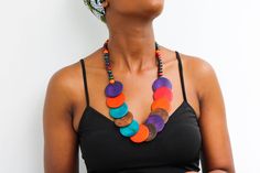 African wooden necklace, Statement Necklace, Wooden Bead Jewelry, Beaded women jewelry, Tribal necklace, Christmas gift for her, Mom's gift An elegant necklace that can compliments any outfit. Handmade by the Maasai women in Kenya using wooden beads. One size fits all. Color: Multi-color Necklace length: 20 inches 3-5 days delivery via DHL Express.  Pay shipping fee for the first item only and additional items ship for FREE. To view more wooden necklaces in our shop, kindly click here:  https://www.etsy.com/shop/NkoroiCrafts?ref=shop-header-name&listing_id=1295099274&section_id=43662872 Wooden Beads Round Necklace As Gift, Wooden Beads Necklace Gift, Gift Wooden Beaded Necklaces, Gift Wooden Beaded Round Necklace, Gift Beaded Necklaces With Wooden Beads, Gift Wooden Beads Necklace, Long Wooden Beaded Necklace For Gift, Wooden Bead Jewelry, Multicolor Necklace