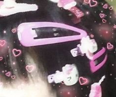 a close up of a hair dryer with hearts on it