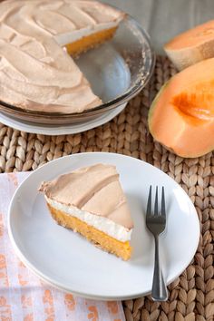 a piece of cake sitting on top of a white plate next to a knife and fork