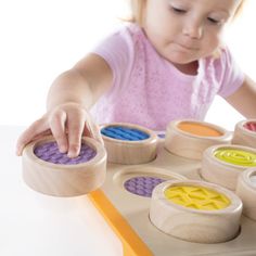 Curious toddlers flip sensory puzzle pieces over to feel and identify them from their bumpy ridges, smooth surfaces, soft plush and more with Tactile Search and Match. Nine different textures on oversized puzzle piece match to a corresponding spot on the sturdy puzzle board. Practice classification and patterning skills with this engaging, tactile matching game. Measures 14"W x 12"D x 2"H. Ages 2+ Guidecraft | Guidecraft Tactile Search & Match 14.75 H x 12.75 W | 14.75" H X 12.75" W | Wayfair Aba Therapy Toys, Sensory Blocks, Waldorf Inspired Toys, Rainbow Blocks, Sensory Board, Sensory Boards, Open Ended Toys, Urban Furniture, Games For Toddlers