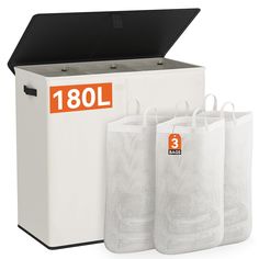 three mesh bags are next to a white storage box with an orange label on it