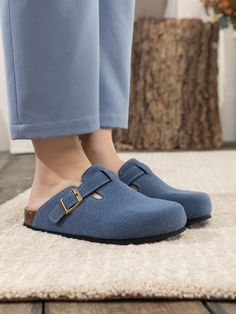 Exude casual-cool style in comfort in these slip-on-and-go clogs, crafted from a soft suede in a versatile neutral hue for effortless pairing. A durable TPU sole ensures tread-safe steps. Suede upper Man-made leather lining Man-made insole TPU sole Luxury Suede Slip-ons With Rubber Sole, Suede Clogs With Textured Sole And Slip-on Fit, Comfortable Blue Slip-resistant Clogs, Blue Suede Slip-on Clogs, Blue Suede Slip-ons With Rubber Sole, Blue Suede Slip-ons With Textured Sole, Reindeer Headband, Grey Crewneck, Daily Dress