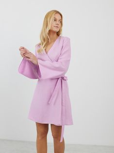 "LYDIA is a long sleeve true wrap closure linen wrap dress. DETAILS - True wrap closure - Long sleeves - Mini length - 100% lightweight European linen fabric - Cut and sewn to order just for you in our studio COLOR - Lilac, you can also choose other colors above - Fabric samples are available here https://www.etsy.com/listing/586569696/linen-fabric-samples SIZING & FIT - Fits true to size - Model is 5'8\" / 173cm and wearing a size S CARE FOR LINEN - Machine wash up to 30ºC/86ºF gentle cycle - Lay flat to dry or tumble dry low - Warm iron if needed - Do not bleach SIZE GUIDE Size conversion guide Size XS (US 0-2, IT 36-38, UK 4-6, Japan 3-5, France 32-34) Size S (US 4-6, IT 40-42, UK 8-10, Japan 7-9, France 36-38) Size M (US 8-10, IT 44-46, UK 12-14, Japan 11-13, France 40-42) Size L (US 1 Summer V-neck Wrap Dress With Tie Fastening, Spring Linen V-neck Wrap Dress, Casual Linen V-neck Wrap Dress, Purple V-neck Wrap Dress, Belted V-neck Linen Midi Dress, Linen Wrap Dress, Elegant Clothing, Summer Linen Dresses, Long Sleeve Mini