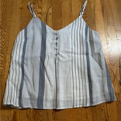 Skies Are Blue Stripe Camisole Tank Size Small Never Worn Coastal Cowgirl Aesthetic Adjustable Straps Feels Like Linen Casual White Tank Top With Straps, Casual Beach Tank Top With Adjustable Straps, Casual Tank Top With Adjustable Straps For Beach, Casual White Tank Top With Spaghetti Straps, Casual Tank Camisole For Day Out, Casual Vacation Tops With Adjustable Straps, Trendy Blue Camisole For The Beach, Casual Tank Top With Adjustable Straps For Day Out, White Spaghetti Strap Camisole Casual Style