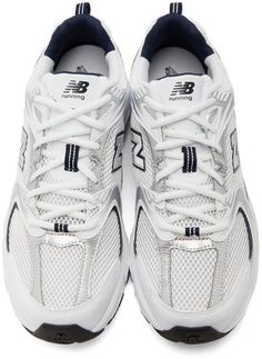 Low-top mesh sneakers in white. Grained faux-leather trim in silver-tone and perforated detailing throughout. Round toe. Tonal lace-up closure. Logo printed at padded tongue. Webbing pull-loop at padded heel collar. Bonded logo appliqué sides. Tonal signature Abzorb™ foam rubber midsole. Treaded rubber outsole in black.Supplier color: Silver New Balance For Women, New Balance Outfit, Mesh Sneakers, Luxury Streetwear, Air Jordan Sneaker, Leather Trims, Low Top, New Balance, Sneakers Nike