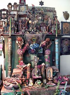 an old dresser with many different items on it