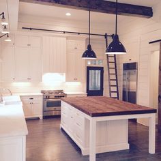 the kitchen is clean and ready to be used as a living room or dining area