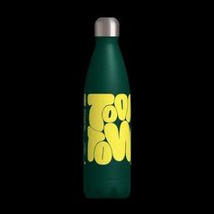 a green and yellow bottle with the word love me on it's side, against a black background