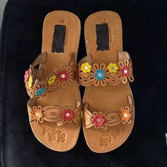 Artisanal Women’s Hippie Style Sandals Color Tan Whit Multicolor Flowers Design 100% Hand Made , 100% Leather Usa Size9, Mexican Size 6, New No Box . Brown Bohemian Flat Heel Sandals, Brown Bohemian Flat Sandals, Leather Sandals For Festivals With Leather Footbed, Leather Sandals With Leather Footbed For Festivals, Leather Sandals With Flat Heel For Festival, Casual Open Toe Toe Ring Sandals For Festivals, Multicolor Sandals With Leather Footbed For Summer, Multicolor Leather Footbed Sandals For Summer, Multicolor Leather Sandals For Summer