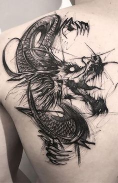 a man with a dragon tattoo on his back