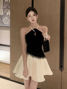 Black And White Spliced Pearl Halter Dress | Dahyun - Twice Black M Bodysuit With Tulle Skirt, Expensive Brands, Belted Denim Dress, Kpop Dress, Trendy Outfits Indian, Fashion Chingu, Corset Fashion, Career Fashion, Buy Dresses Online