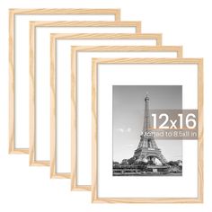 four wooden frames with an image of the eiffel tower in black and white