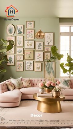 a living room with green walls and pictures on the wall above the couch, along with pink furniture