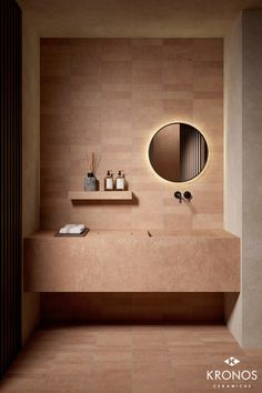 a bathroom with a sink, mirror and towel rack in it's center area