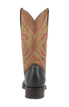 Vibrant embroidery amplifies the Western appeal of this gritty cowboy boot with a classic snoot toe and stockman heel. Pull-on style Removable, cushioned insole Leather upper/textile lining/synthetic sole Imported Western Moc Toe Boots For Rodeo, Country Style Black Boots With Snip Toe, Black Work Boots With Reinforced Toe For Ranch, Country Style Black Snip Toe Boots, Western Black Boots For Country Events, Black Work Boots With Round Toe For Ranch, Black Country Style Boots For Ranch, Black Reinforced Toe Work Boots For Ranch, Black Western Boots For Country Events