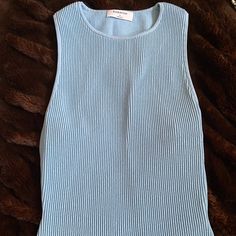 Nwt Light Blue Sculpt Knit Muscle Tank. Size Small Light Blue Fitted Knitted Tops, Chic Stretch Blue Knit Top, Chic Blue Soft Knit Top, Trendy Fitted Blue Knit Top, Fitted Blue Trendy Knit Top, Trendy Blue Fitted Knit Top, Fitted Blue Knit Top, Blue Stretch Knit Top, Light Blue Ribbed Knit Top