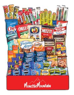 a display case filled with lots of different types of snacks and candy bar wrappers