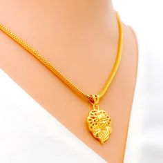 This classy pendant is crafted from 22k gold, weighing 3.1 grams, featuring a unique netted design that encases the revered symbols OM and Sai in a stunning yellow gold finish. The pendant measures 1 inch in length, making it a perfect size for everyday wear while embodying spiritual depth and elegance. Ideal for devotees seeking a blend of faith and fashion, this OM Sai pendant offers a sophisticated approach to spiritual jewelry, providing a serene yet stylish reminder of divine presence and g Gold Locket Necklace In 22k Gold, Gold Round Pendant Necklace For Diwali, 22k Gold Pendant Necklace With Locket, Yellow Gold Round Pendant Necklace For Puja, 22k Yellow Gold Necklaces For Diwali, Yellow Gold Pendant Necklaces For Puja, Yellow Gold 22k Necklace For Diwali, 22k Yellow Gold Necklace For Diwali, Om Pendant Gold For Women