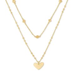 Love to layer? Meet your match with the Kendra Scott Ari Heart Multi Strand Necklace that features two delicate chains that come together for the perfect layered look. For a touch of romance, the longer strand features an asymmetrical heart pendant, while the shorter stand adds a little edge with geometric stations. Crafted in 14k gold-plated brass, the chains measure 14 inches and 16 inches in length and come with a 2 inch extender. Kendra Scott Necklace, Jewelry Bag, Broken Chain, Necklace Fashion, Kendra Scott Jewelry, Accessories Jewelry Necklace, Multi Strand Necklace, Body Products, Strand Necklace