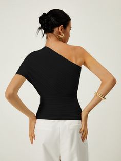 Details Composition: 49.5% Viscose, 30.5% Polyester, 20% Nylon Design: Asymmetrical, Cold Shoulder, Knotted Style: Elegant, Sexy Thickness: Regular Material: Knit Occasion: Vacation, Work Size Fit Stretch: Medium Stretch Fit Type: Slim Fit Cm Inch Size Length Bust XS 45 72 S 45.5 76 M 46 80 L 46.5 86 XL 47 92 XS 17.7 28.3 S 17.9 29.9 M 18.1 31.5 L 18.3 33.9 XL 18.5 36.2 Care Instructions Maximum washing temperature for hand washing is 40°C Do not bleach Flat dry Do not iron Mild dry cleaning Fitted Ribbed Tops For Evening, Fitted Ribbed Evening Tops, Solid Color Bodycon Top For Party, Solid Color Bodycon Party Top, Solid Bodycon Top For Party, Ribbed Bodycon Tops For Summer, Solid Bodycon Party Top, Ribbed Bodycon Summer Tops, Ribbed High Stretch Top For Night Out