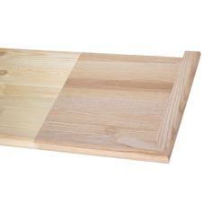 a wooden cutting board with two different sections