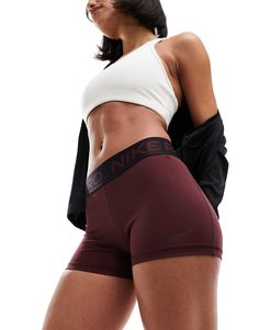 Shorts by Nike Training Be your own gym crush Mid rise Elasticized waistband Nike branding bodycon fit