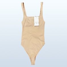 Size S (Runs Small) Square Neckline Straps Are Not Adjustable Snap Closure On Bottom Material: 71% Viscose, 22% Polyamide, 7% Elastane Retails For $30 Beige Beachwear Bodysuit For Summer, Beige Summer Beachwear Bodysuit, Fitted Beige Bodysuit For Summer, Beige One-piece Bodysuit For Spring, Spring Beige One-piece Bodysuit, Spring Beige Lined Bodysuit, Summer Cotton Bodysuit With Lined Body, Summer Cotton Lined Bodysuit, Summer Cotton One-piece Bodysuit