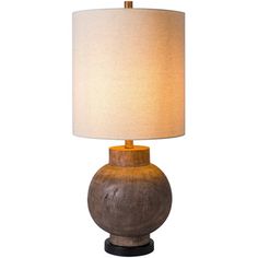 a wooden table lamp with a white shade