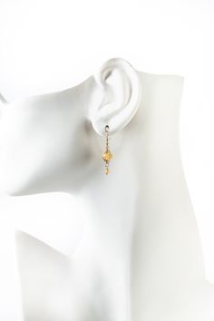 A beautiful gift for those born in November, featuring their birthstone of stunning citrine that is hand wrapped in a gold filled herringbone weave. These elegant earrings dangle from gold filled ear wires. Gold Filled (lead and nickel free) Citrine 1", on gold filled ear wires We hand select our natural materials, thus there may be slight variations in color and/or size that will not detract from the overall aesthetic Our unique handcrafted designer jewelry for women is made in America, with ea Hypoallergenic Yellow Gold Wrap Earrings, Amber Dangle Earrings With Ear Wire, Gold Briolette Crystal Earrings With Ear Wire, Delicate Gold Wire Wrapped Earrings, Amber Wire Wrapped Drop Earrings, Gold Dainty Hypoallergenic Crystal Earrings, Yellow Gold Wire Wrapped Dangle Earrings, Wire Wrapped 14k Gold Filled Yellow Gold Earrings, 14k Gold Filled Wire Wrapped Yellow Gold Earrings