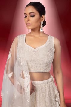 Introducing the Bridal Lehenga BL-172, a stunning and elegant choice for any bride-to-be. Featuring intricate sequences and beads work, this lehenga exudes luxury and sophistication. With its detailed craftsmanship, it is sure to make you feel like royalty on your special day. Elevate your bridal look with this timeless piece. Ivory Bridal Lehenga, Beads Work, Ivory Bridal, Your Special