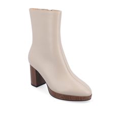 Introducing the Romer booties from Journee Collection,. Made from luxurious vegan leather, these booties are a versatile complement to any outfit. With a wood platform and block heel, they add a trendy touch to your look. The center seam detail and almond toe enhance their subtly chic appeal. Designed with a wide-width fit and a comfortable 4 mm Tru Comfort Foam™ insole, these booties ensure the perfect fit all day long. Easily slip them on with the convenient inside zipper for effortless style Keen Style, Platform Block Heels, Trending Sneakers, Shoe Carnival, Leather Block Heels, Journee Collection, Athletic Fashion, Faux Wood, Bootie