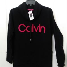 Nwt Calvin Klein Small Black Funnel Neck Drawstrings Pink Logo Pullover Calvin Klein Women's Sweatshirt Black Mock Neck Pink Logo Ck Small Fleece Lined Calvin Klein Cowl Neck Pullover Sweater Is Comfortable, Warm And Fashionable. Mock Neck With Drawstring 60% Cotton, 40% Polyester Machine Wash Cold Water Do Not Use Fabric Softener Do Not Bleach L 27.5" Armpit To Armpit 24" Thanks For Your Business Trendy Calvin Klein Tops For Fall, Trendy Calvin Klein Fall Tops, Trendy Calvin Klein Top For Fall, Fitted Pink Sweatshirt, Calvin Klein Crew Neck Winter Tops, Calvin Klein Crew Neck Tops For Loungewear, Calvin Klein Winter Crew Neck Tops, Black Calvin Klein Tops For Winter, Calvin Klein Black Winter Tops